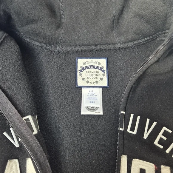 Vancouver Canucks NHL Zip Hoodie Black Spellout Logo Women’s Large NWT - Picture 8 of 9
